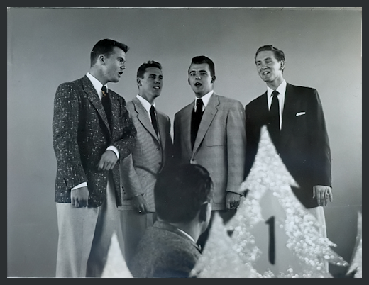 Old black and white photos of Jonathan Cormur Murphy's grandfather singing in a quartet.